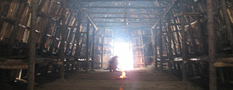 inside longhouse with firepit