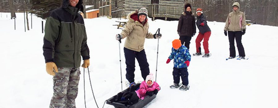 Families snowshoeing