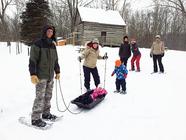 Families snowshoeing