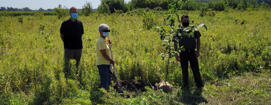 L to R - Randall VanWagner (LTVCA), Roberta Dixon (sister of the late John Skakel), Nathan McKinlay (McKinlay Funeral Homes Ltd.) Planting the first memorial tree (Paper Birch) in memory of John Skakel today at the Skakel Conservation Area.