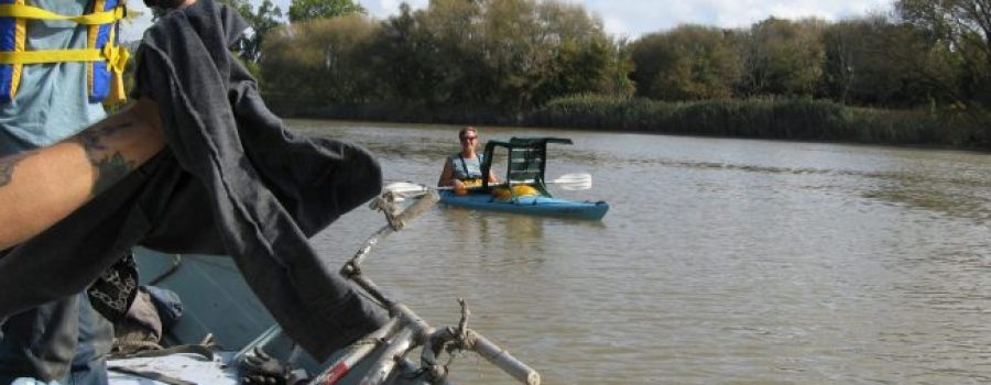 Imagine McGregor CK Paddle and Clean Oct 9 2021 people canoeing and picking up litter on river