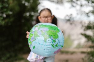 child with globe