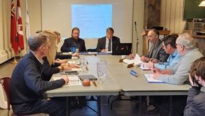 Photo of people at a table. LTVCA Annual General Meeting held at the University of Guelph Ridgetown Campus on March 2, 2023. 